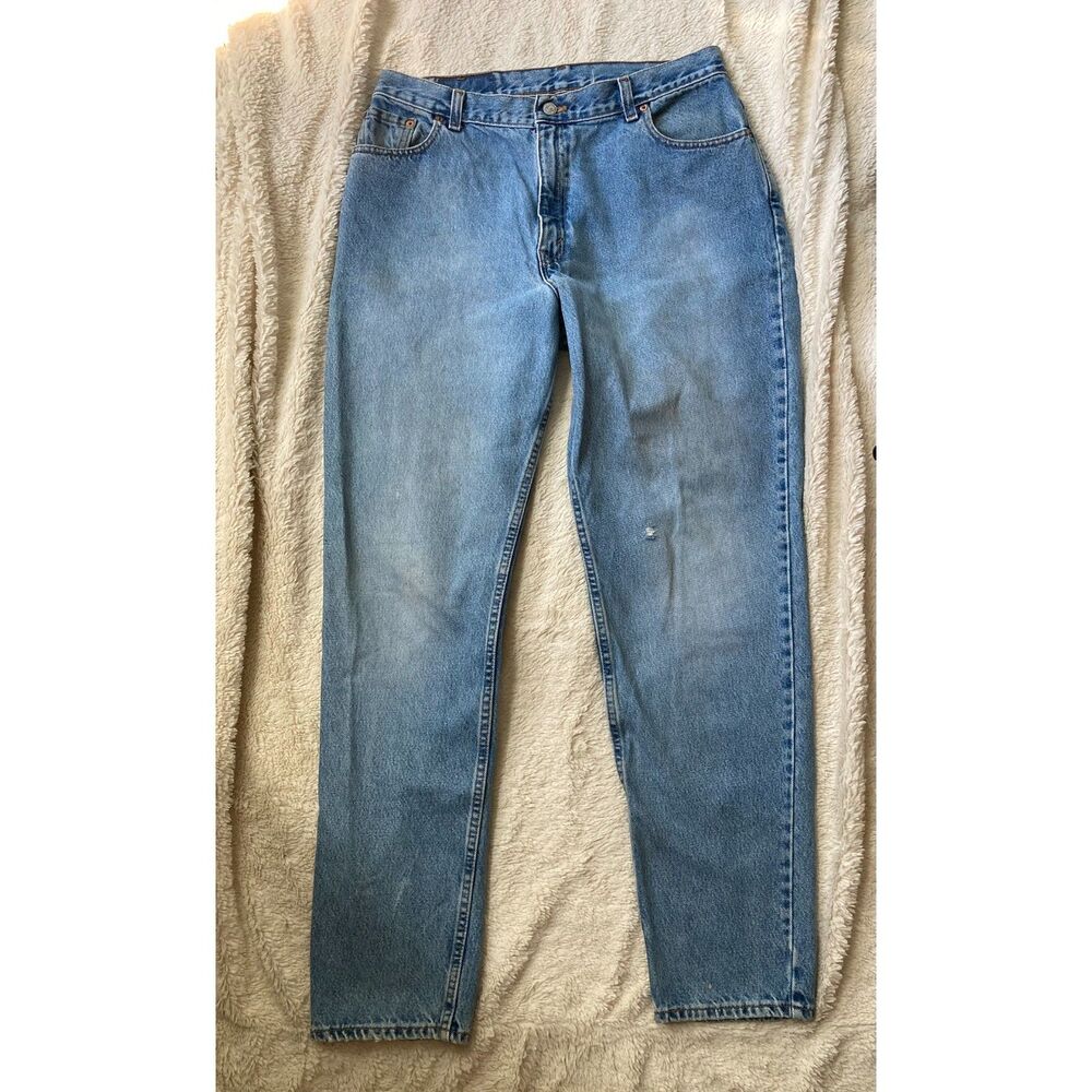 Vintage Levi's 550 Relaxed Tapered Light Wash Faded & Distressed USA Made Jeans